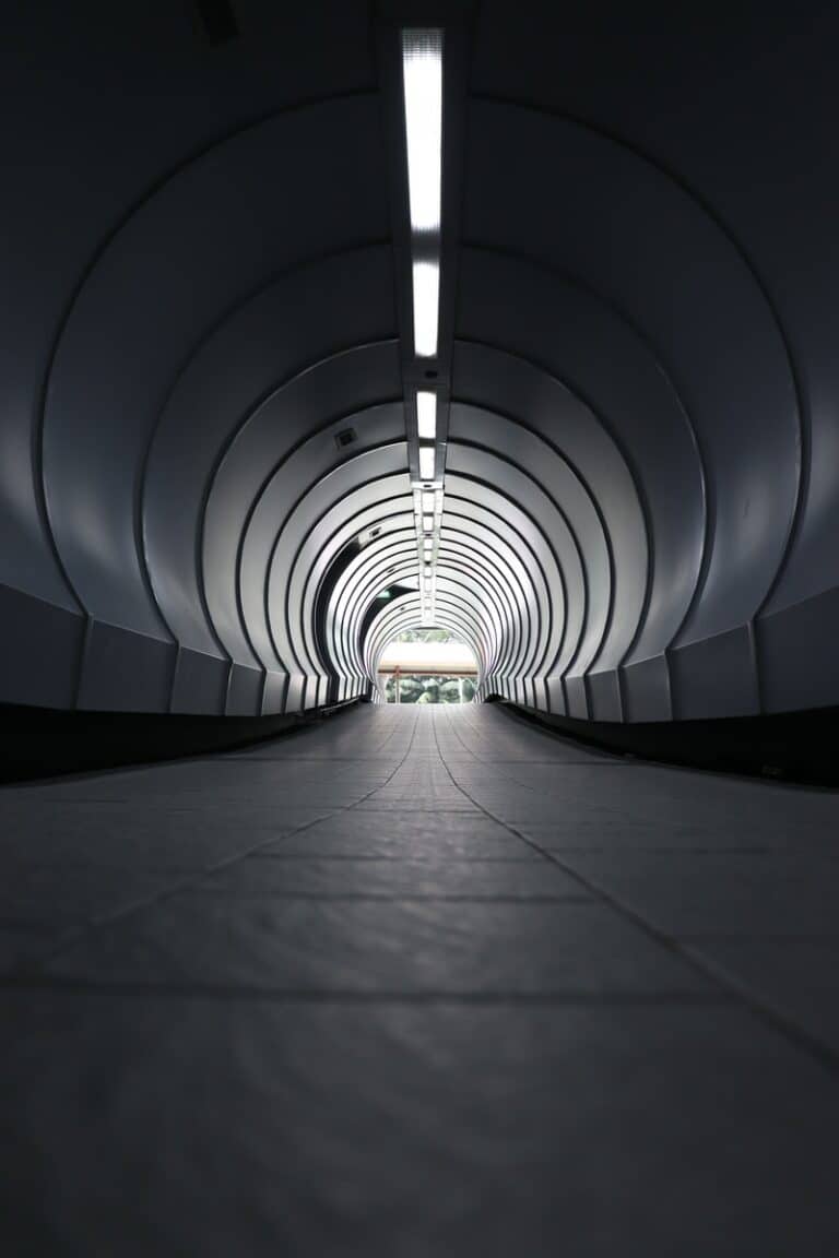 gray tunnel with white light
